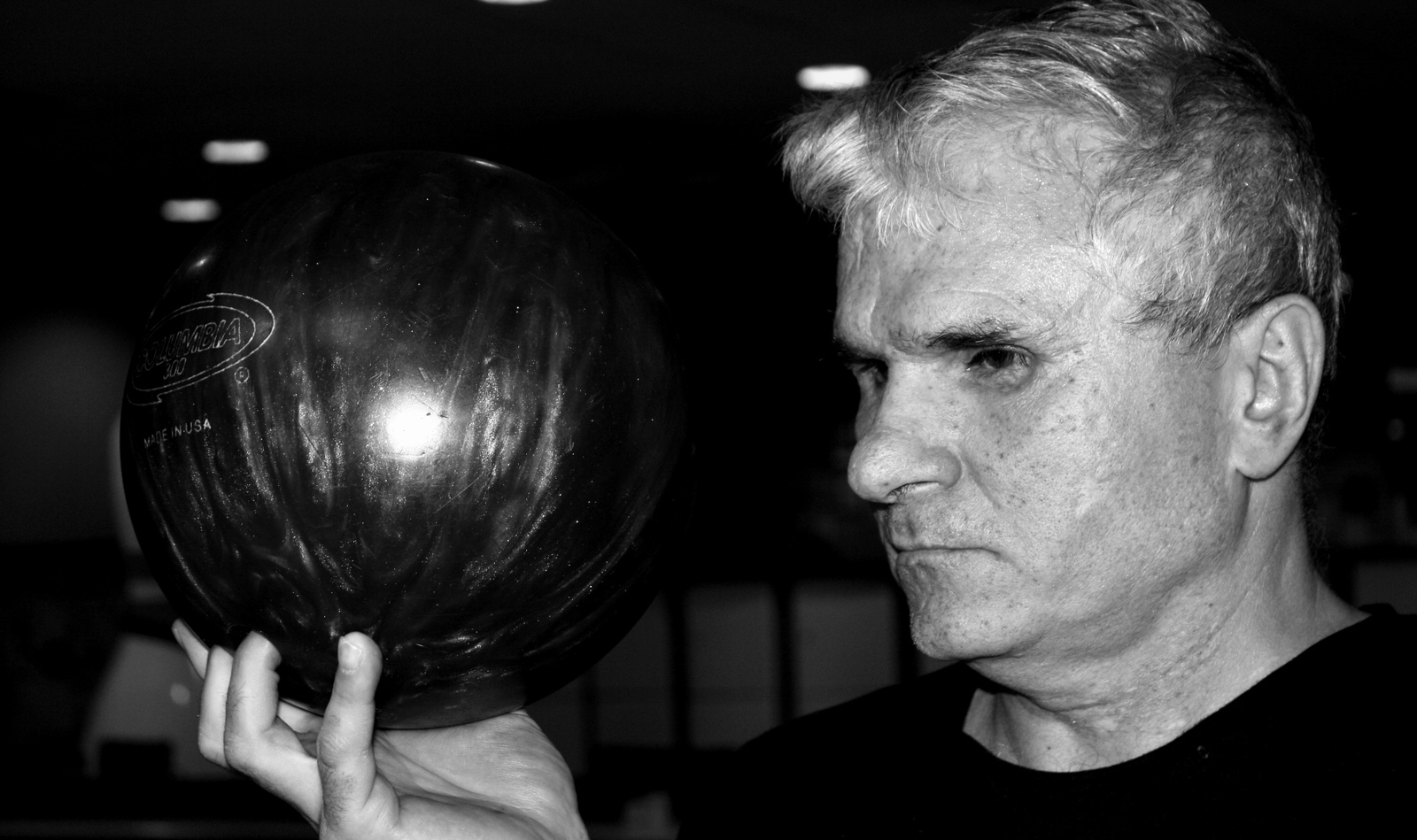 Shlomi Lazmy bowling in Holon. Photo by Leon Medalia