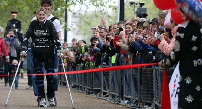 Claire Lomas nearing the end of the Virgin London Marathon. Photo courtesy of Argo Medical Technologies