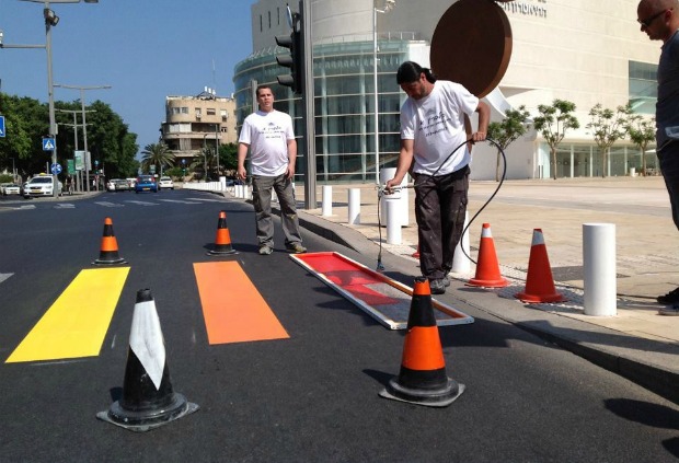 tel-aviv-pride Tel Aviv painted its crosswalks in rainbow colors as a prelude to Gay Pride Week.