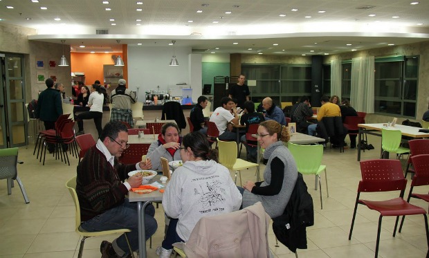One of the goals of Café Motek is to socially integrate people with and without psychiatric disabilities. Photo courtesy of Enosh