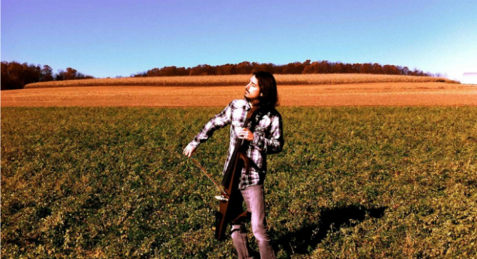 Taking his cello into nature.