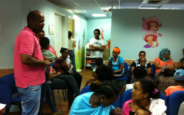 migrant-education An Eritrean nurse educating Tel Aviv migrant mothers about vitamin D.