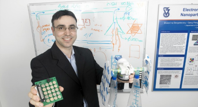 Hossam Haick with the components of his Na-Nose