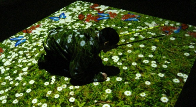 The VR system turns the floor of the therapy room into a virtual environment.