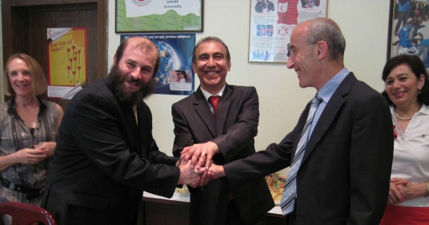 From left, Tag International Development founder Rabbi Yossi Ives, Vice President Gafar Asgarzade of the Azerbaijan Red Crescent Society and then-Israeli Ambassador Michael Lotem.