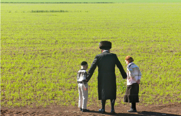 hassidim-field “View from a Gas Station” by Dina Lustiger