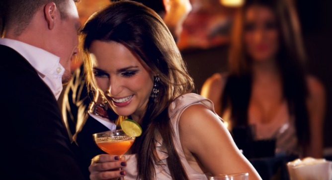 How does our brain enable us to tune into one conversation in a busy environment? Image via Shutterstock.