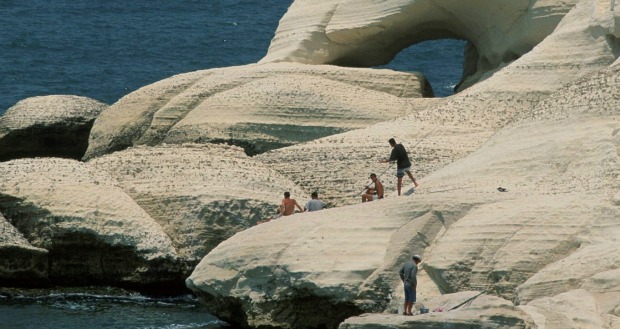 Claiming rocks at Rosh Hanikra. Photo by Flash90.