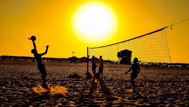 Beach volleyball courts are open into the night in Herzliya. Photo by Ohr Mani