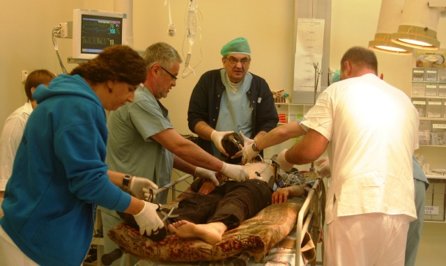 Israeli personnel treating a Syrian.