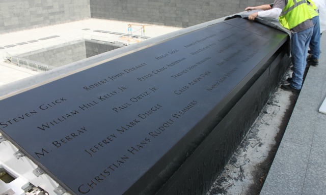 The bronze panel of names.