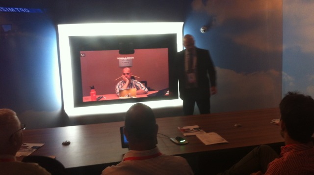 TelePresence creates a virtual conference room.