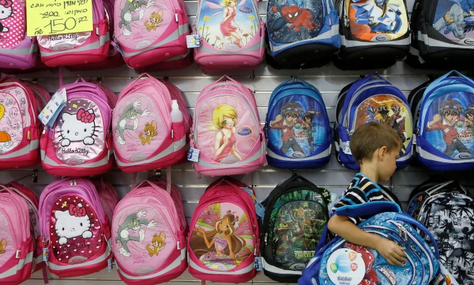 Buying school bags in preparation for the first day of school. Photo by Flash90.