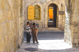 Two boys waiting in Jerusalem