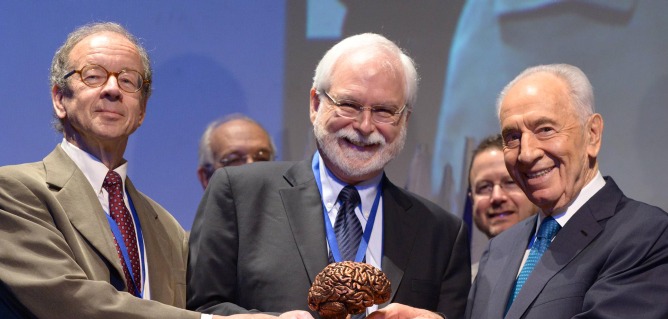Israeli President Shimon Peres, right, awarded the $1 million B.R.A.I.N. Prize to BrainGate’s Dr. John Donoghue, middle, and Prof. Arto Nurmikko from Brown University. Photo by Mark Neyman/FLASH90