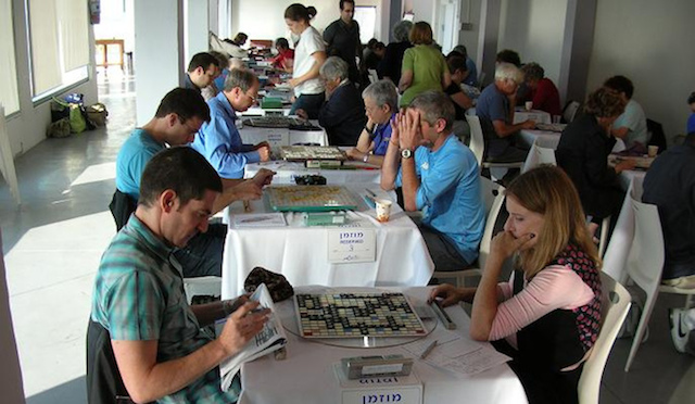 Evan Cohen, left -- Israel's top ranked Scrabble player on the international circuit -- plays Naomi Landau at a previous Israeli Open Scrabble Tournament. Evan Cohen, left -- Israel's top ranked Scrabble player on the international circuit -- plays Naomi Landau at a previous Israeli Open Scrabble Tournament.