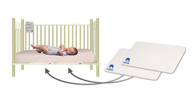 Babysense slips under the crib mattress.
