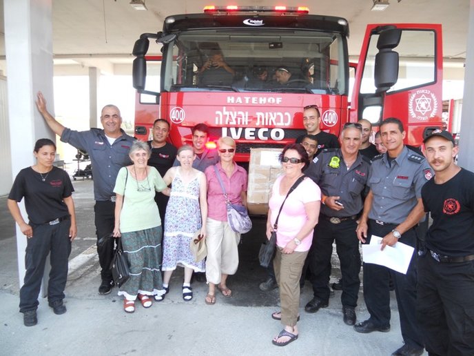 From left, Vicky Savitz, Sara Burrows, Orli Avior and Karen Rafael brought care packages to Ashkelon firefighters. Photo courtesy of June Narunsky.