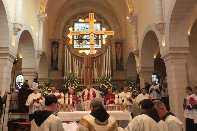 Latin Patriarch of Jerusalem Fouad Twal leads Christmas Eve Mass at St. Catherine Church in Bethlehem last year. Photo by Issam Rimawi/FLASH90