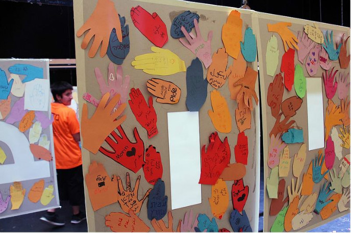 Haifa fifth- and sixth-graders created this multilingual mural of hands.