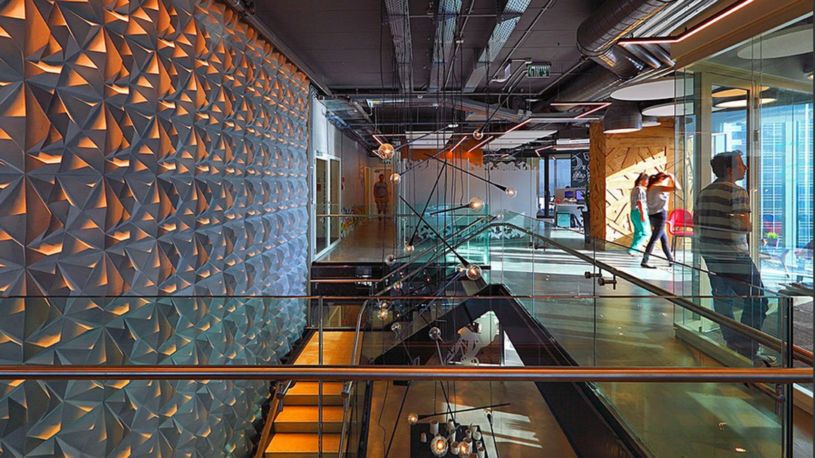 Funky surfaces and lighting make for a stimulating workspace. Photo by Uzi Porat