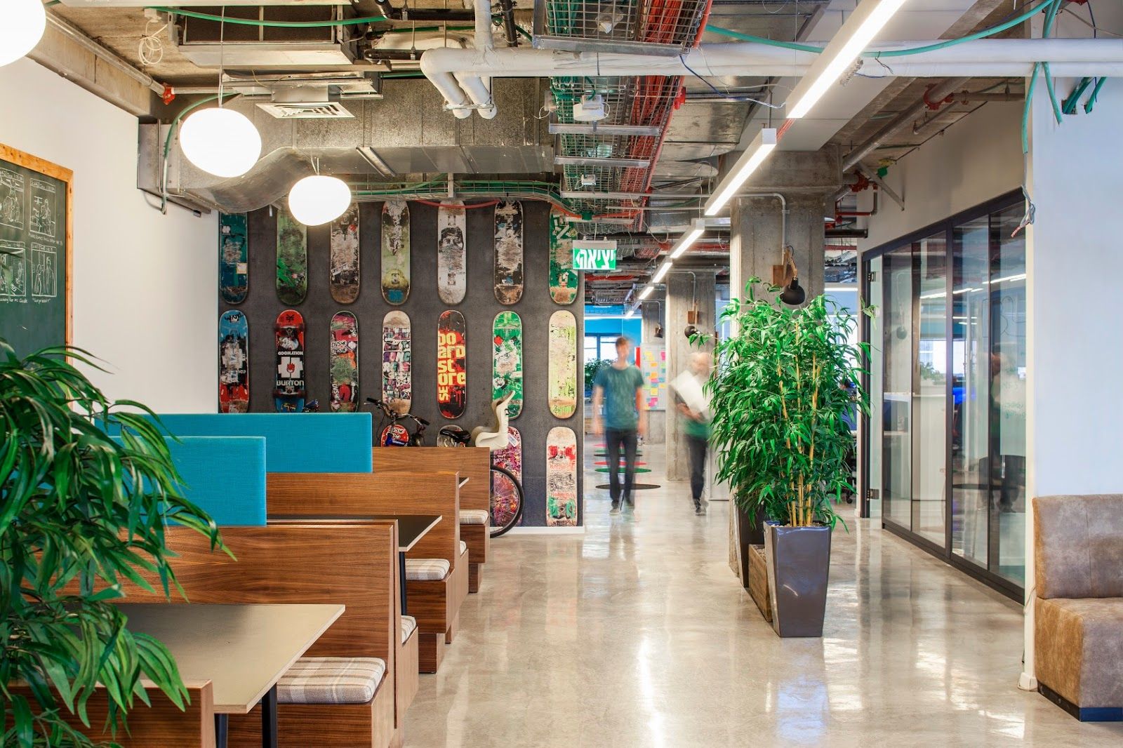 Mounted surfboards remind SundaySky workers they’re in beach territory. Photo by Amit Giron