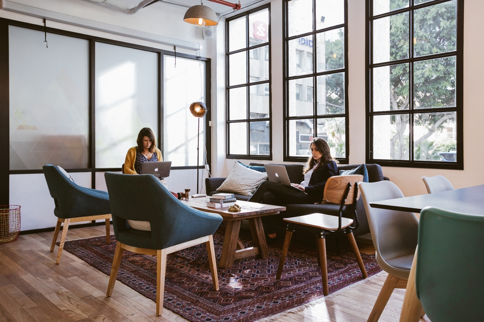 Lamps and chairs are similar throughout the WeWork network but local designers add their own touches. Photo by Shiran Carmel