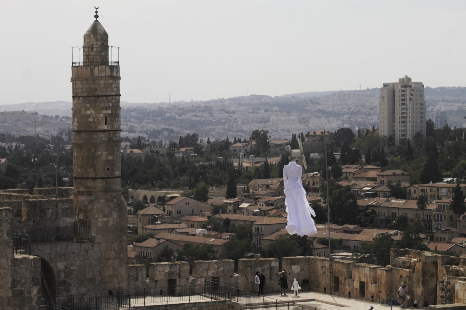 Motti Mizrahi's suspended dress installation at the Tower of David Museum for Biennale 2015.  Photo by Ricky Rachman