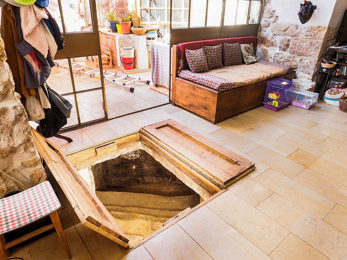 The owners installed trap doors over the mikvah opening. Photo by Assaf Peretz/Israel Antiquities Authority