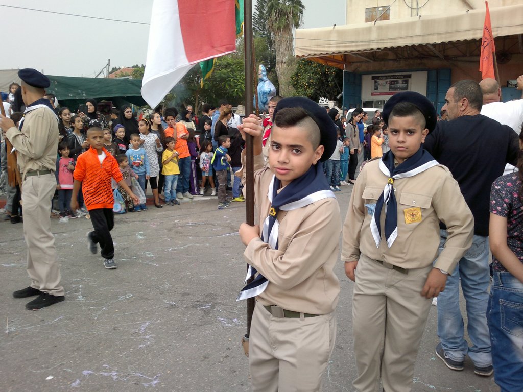 Children marching to church on St. George Day in Lod. Photo by Abigail Klein Leichman
