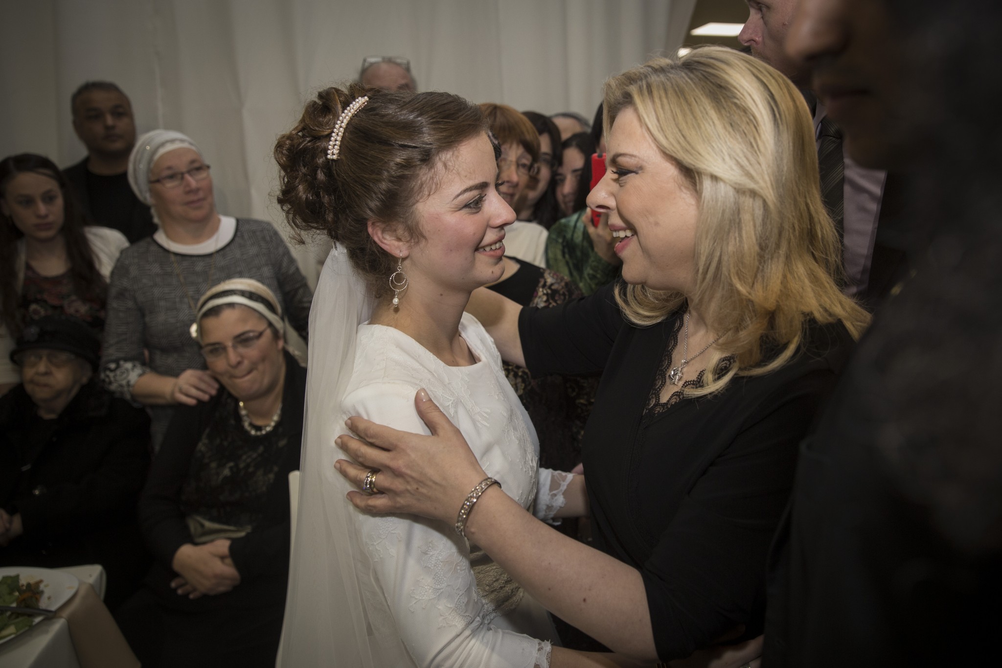 Sara Netanyahu greeting Sarah Litman at her wedding in the Jerusalem International Convention Center. Photo by Hadas ParushFLASH90 Sara Netanyahu greeting Sarah Litman at her wedding in the Jerusalem International Convention Center. Photo by Hadas Parush/FLASH90