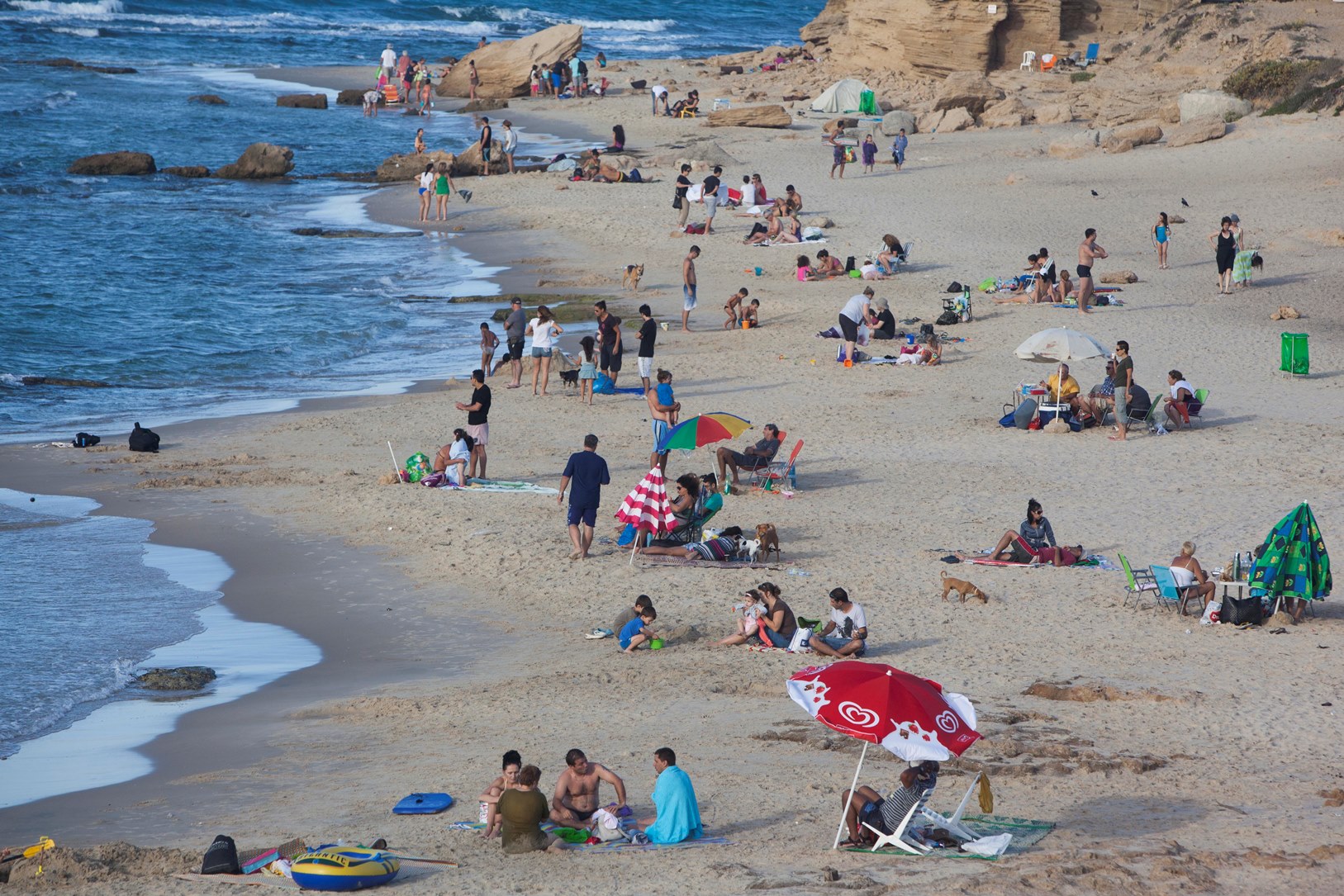 Sunbathers at Palmahim Beach near Rishon LeZion. Photo by Yonatan Sindel/FLASH90