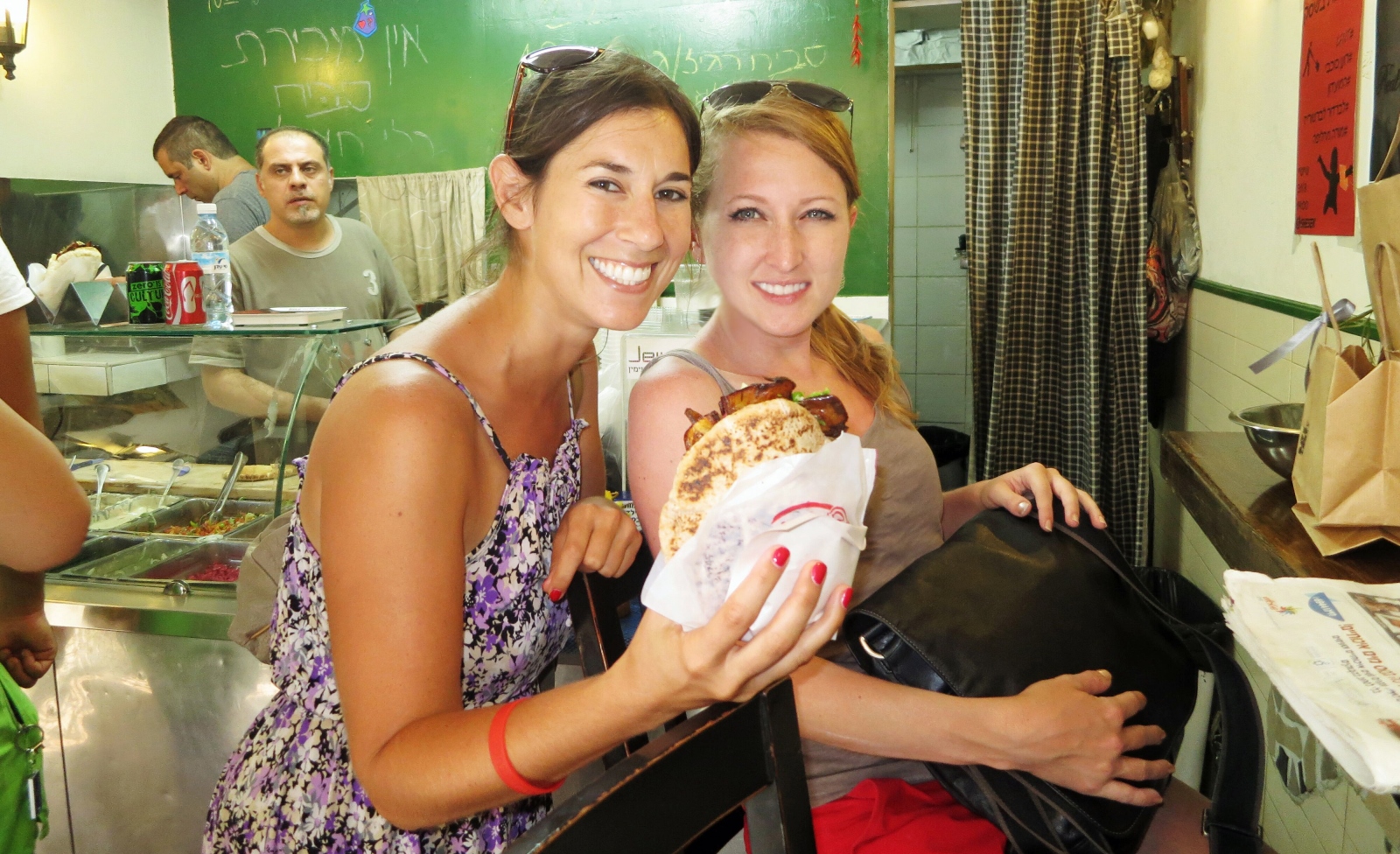 Inbal Baum, left, with a client on an Eat Tel Aviv Tour. Photo: courtesy Inbal Baum, left, with a client on an Eat Tel Aviv Tour. Photo: courtesy