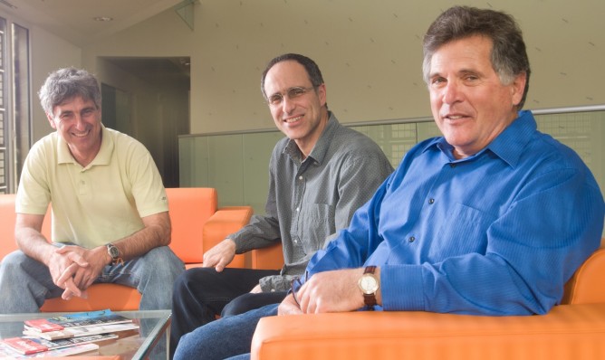 Prof. Eilon Adar, right, with colleagues at Ben-Gurion University. Photo by Dani Machlis/BGU