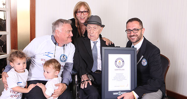 Israel Kristal poses with Guinness World Records’ Head of Records Marco Frigatti, Kristal's son Heim Kristal, daughter Shula Kuperstoch and great grandchildren. Photo by Guinness World Records Israel Kristal poses with Guinness World Records’ Head of Records Marco Frigatti, Kristal's son Haim Kristal, daughter Shula Kuperstoch and great grandchildren. Photo by Guinness World Records
