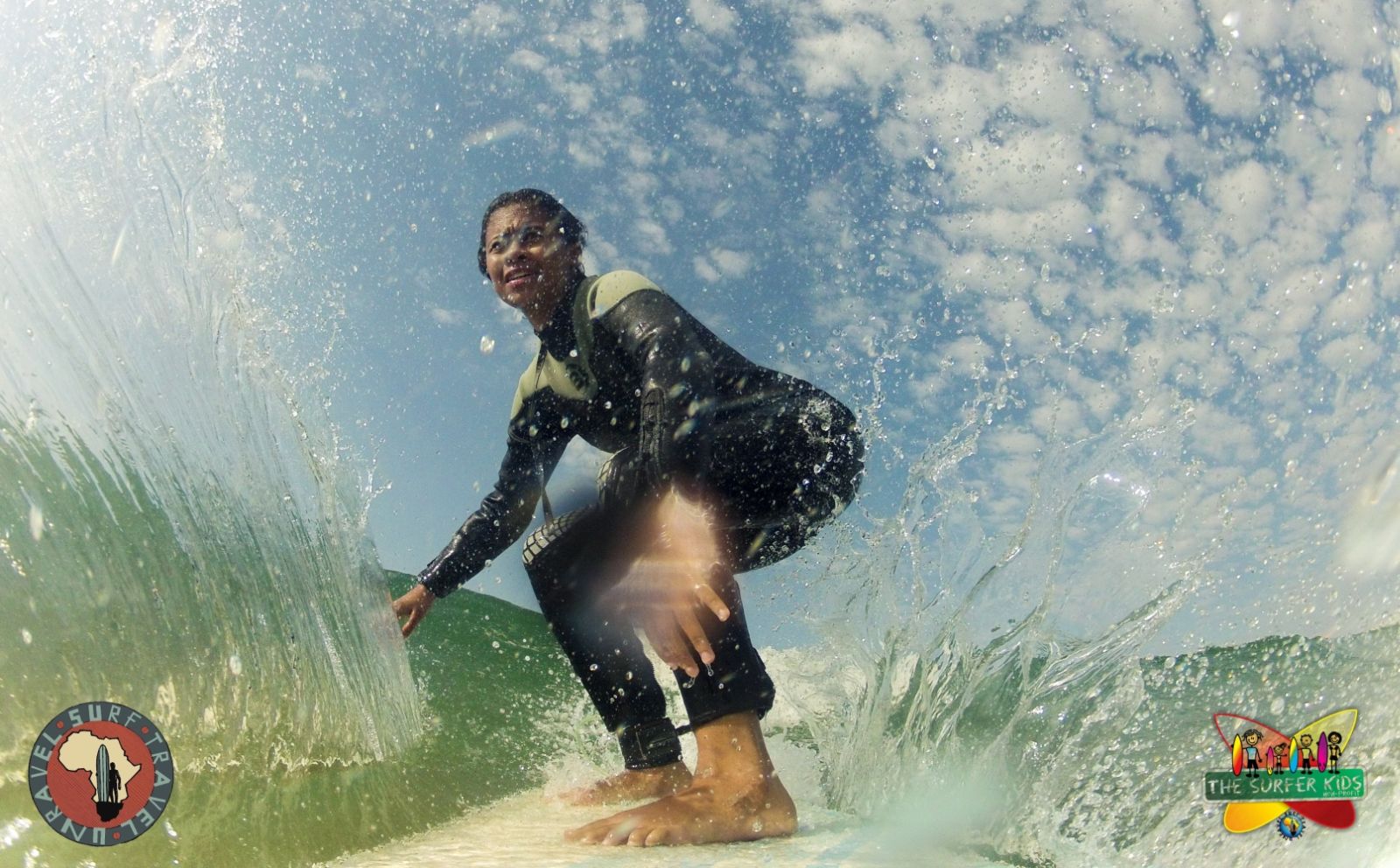 The Surfer Kids- South Africa: A Surfer Kid from Friemersheim, a rural community in South Africa. Travelers can surf with the nonprofit, The Surfer Kids and tour proceeds go toward supporting underprivileged children. 