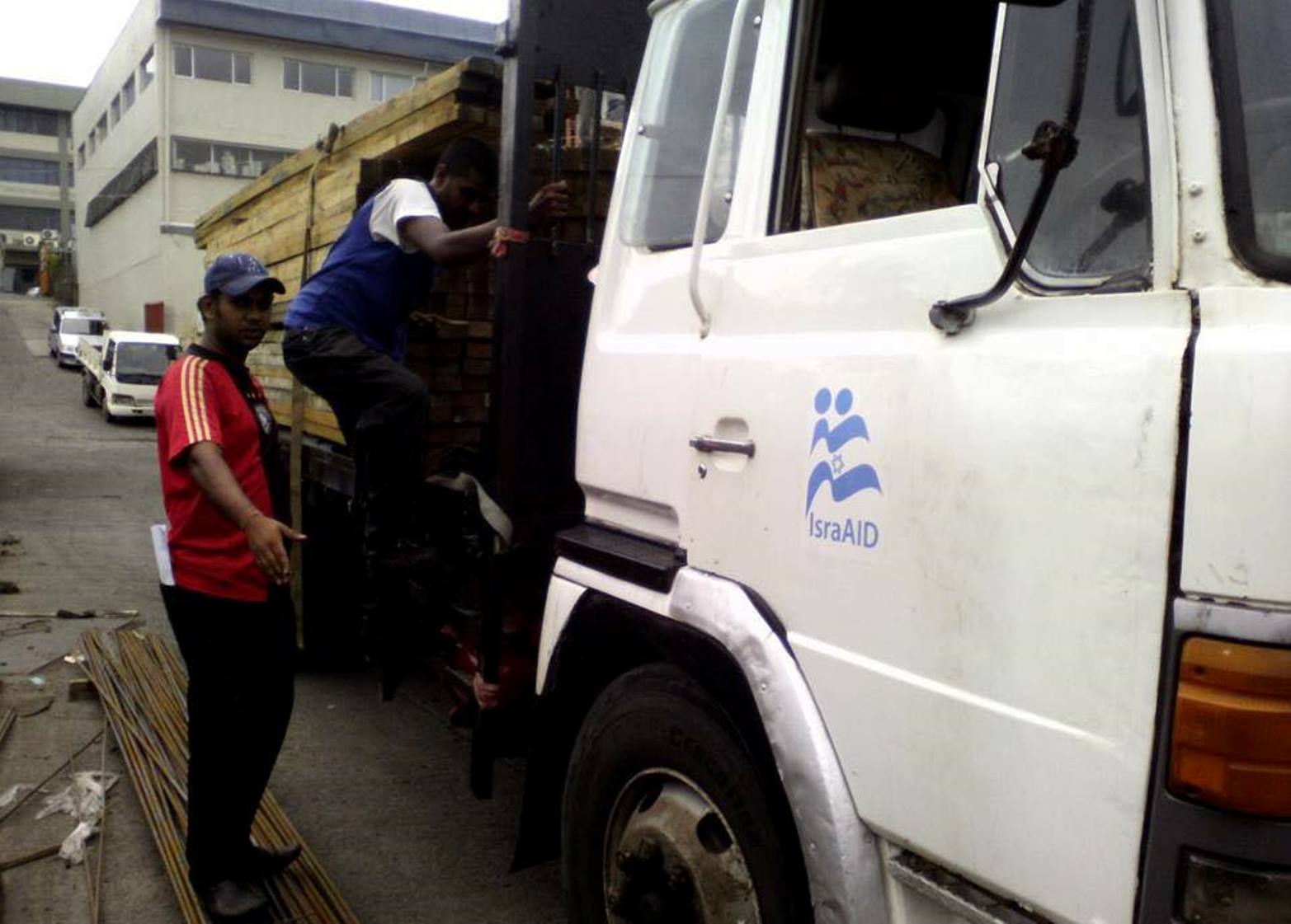 IsraAID is distributing building supplies in Fiji. Photo via Facebook IsraAID is distributing building supplies in Fiji. Photo via Facebook