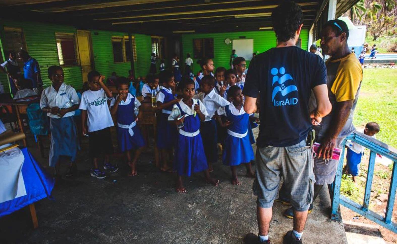 An IsraAID volunteer working with schoolchildren in Fiji. Photo via Facebook An IsraAID volunteer working with schoolchildren in Fiji. Photo via Facebook