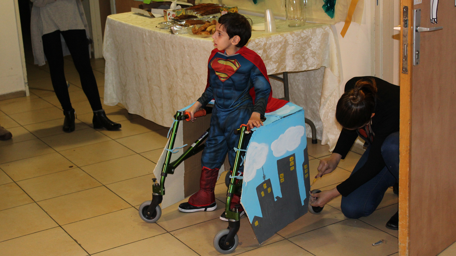 Design students helped six-year-old Brian become Superman for the day. Photo courtesy of Beit Issie Shapiro Design students helped six-year-old Brian become Superman for the day. Photo courtesy of Beit Issie Shapiro