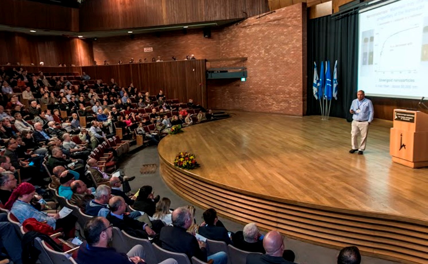 Prof. Shlomo Magdassi, director of the 3D and Functional Printing Center at the Hebrew University, speaking at the advanced materials conference. Photo courtesy of Yissum