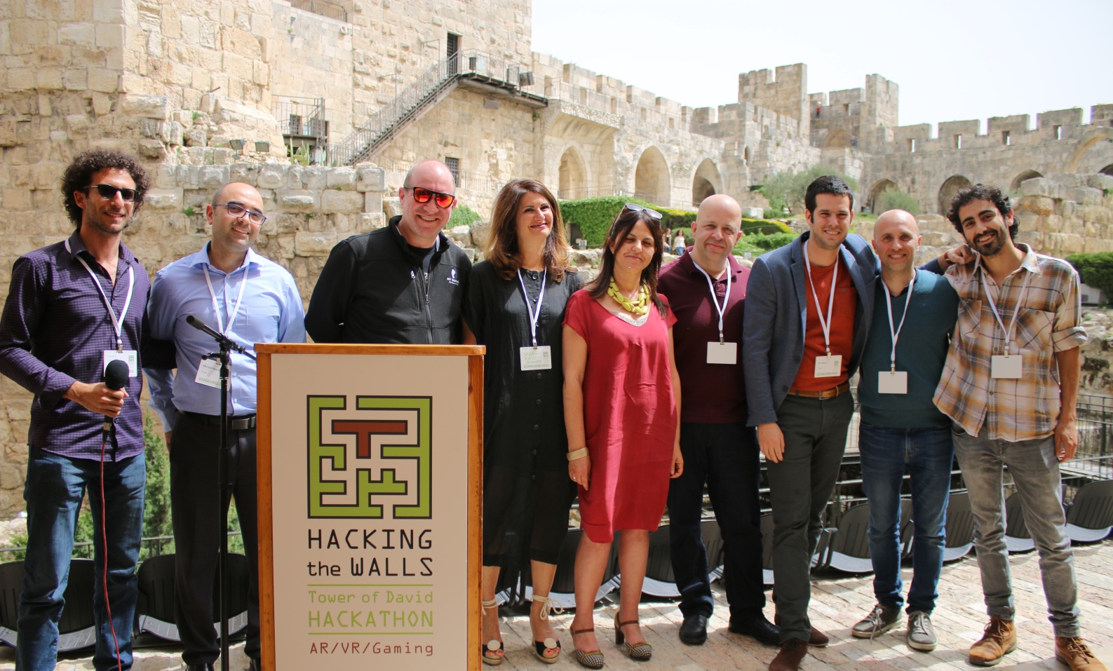 Cap: From left, Doron Ish Shalom of the Israel Innovation Institute, AtoBe Accelerator Director Michael Mizrahi, Elie Wurtman of PICO Partners, Sarah Kass of iJerusalem, Tower of David Museum director Eilat Lieber, Itzik Ozer of the Jerusalem Development Authority, and the second-place Proverb team. Photo courtesy of the Tower of David Museum