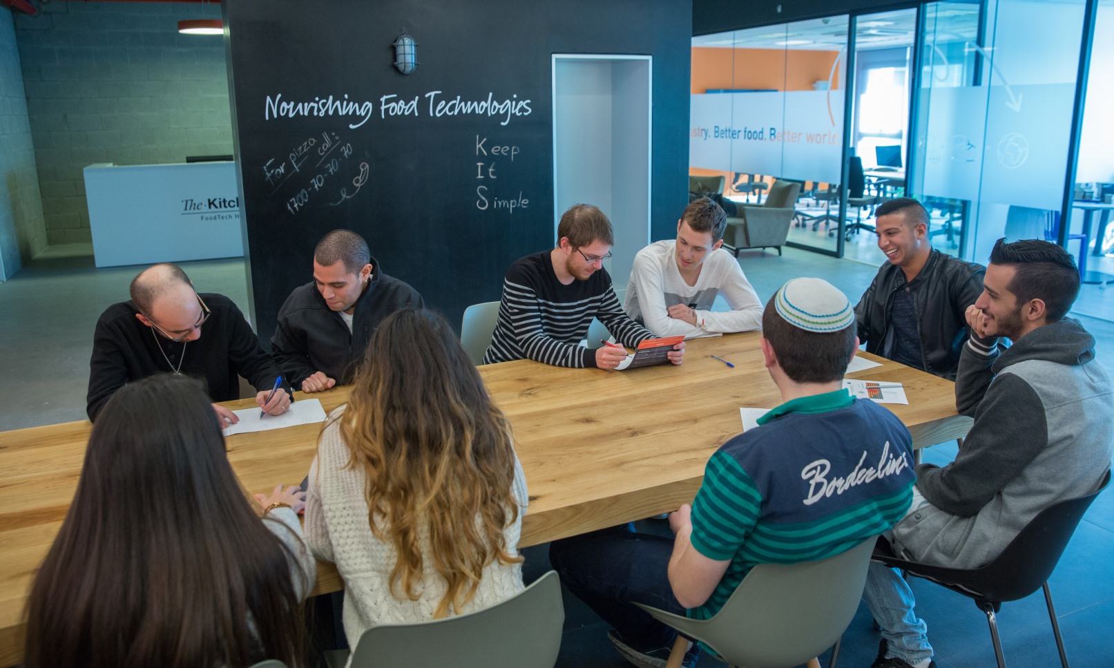 Incubator participants hard at work cooking up food techs of the future. Photo courtesy of The Kitchen
