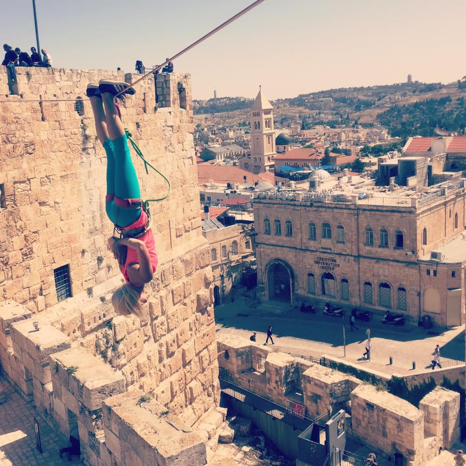 Heather Larsen hangs above history in Jerusalem's Old City. Photo via Facebook