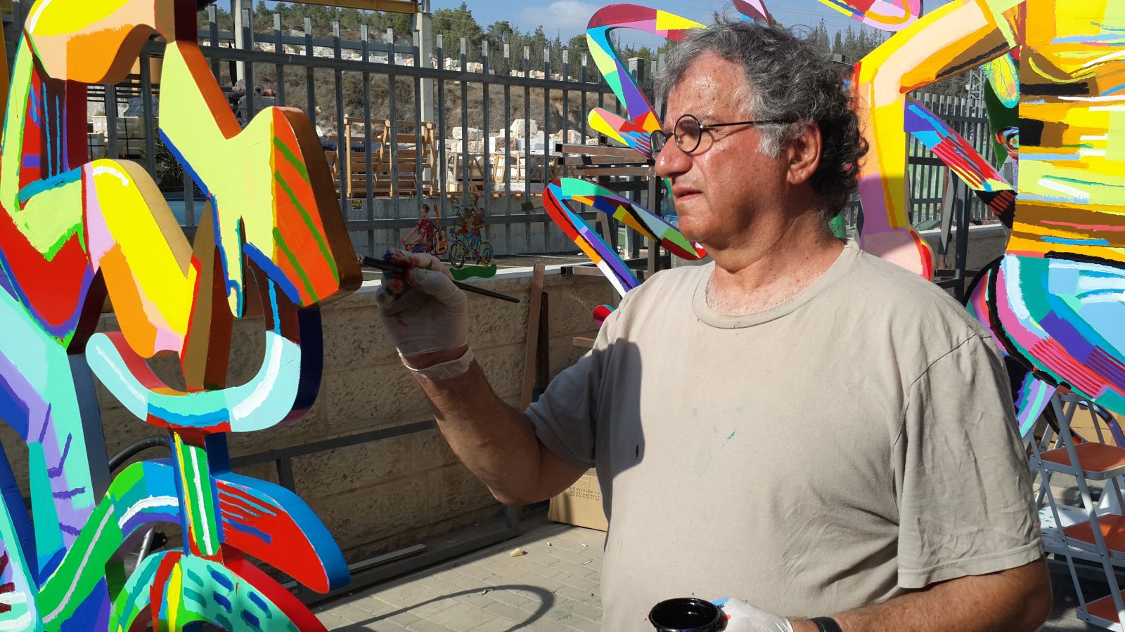 The artist at work. Photo courtesy of David Gerstein