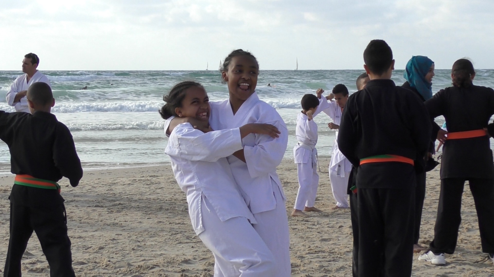 Learning martial arts together is fun. Photo courtesy of Budo for Peace