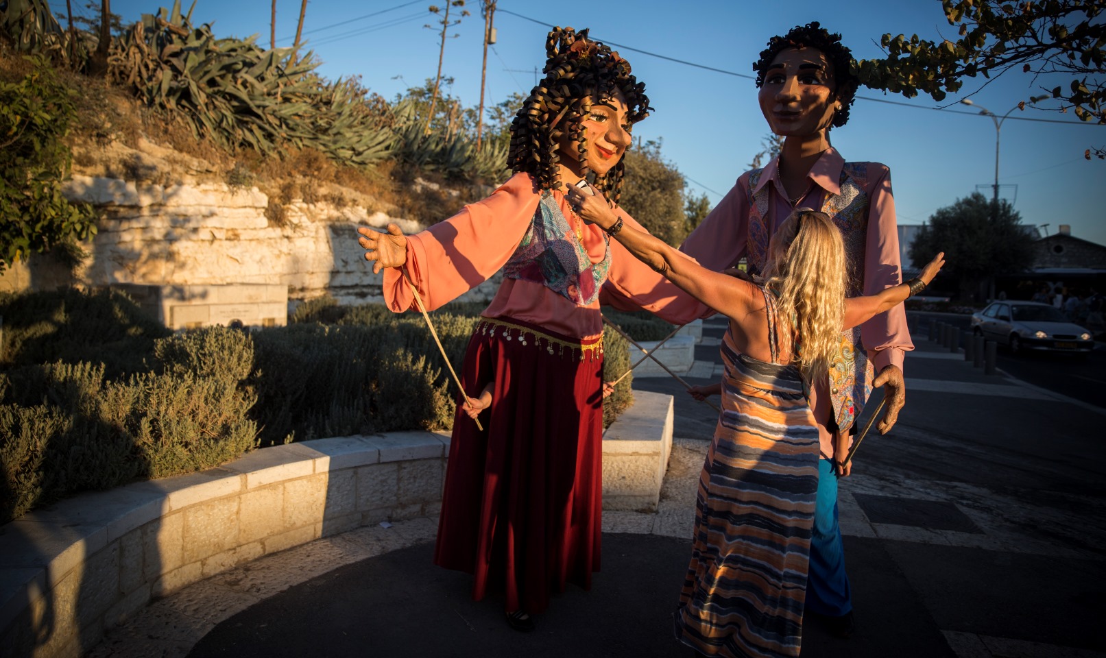 The International Puppet Theater Festival last year in Jerusalem featured human puppets welcoming people off the streets. Photo by Hadas Parush/FLASH90