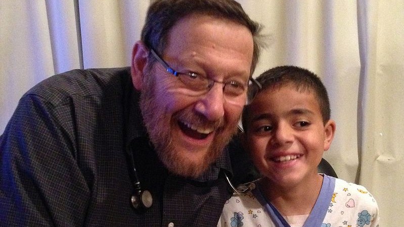 Dr. Rein with Mohamed, who was treated successfully for Marfan syndrome, an inherited disorder that affects the heart. Photo courtesy of A Heart for Peace Dr. Rein with Mohamed, who was treated successfully for Marfan syndrome, an inherited disorder that affects the heart. Photo courtesy of A Heart for Peace