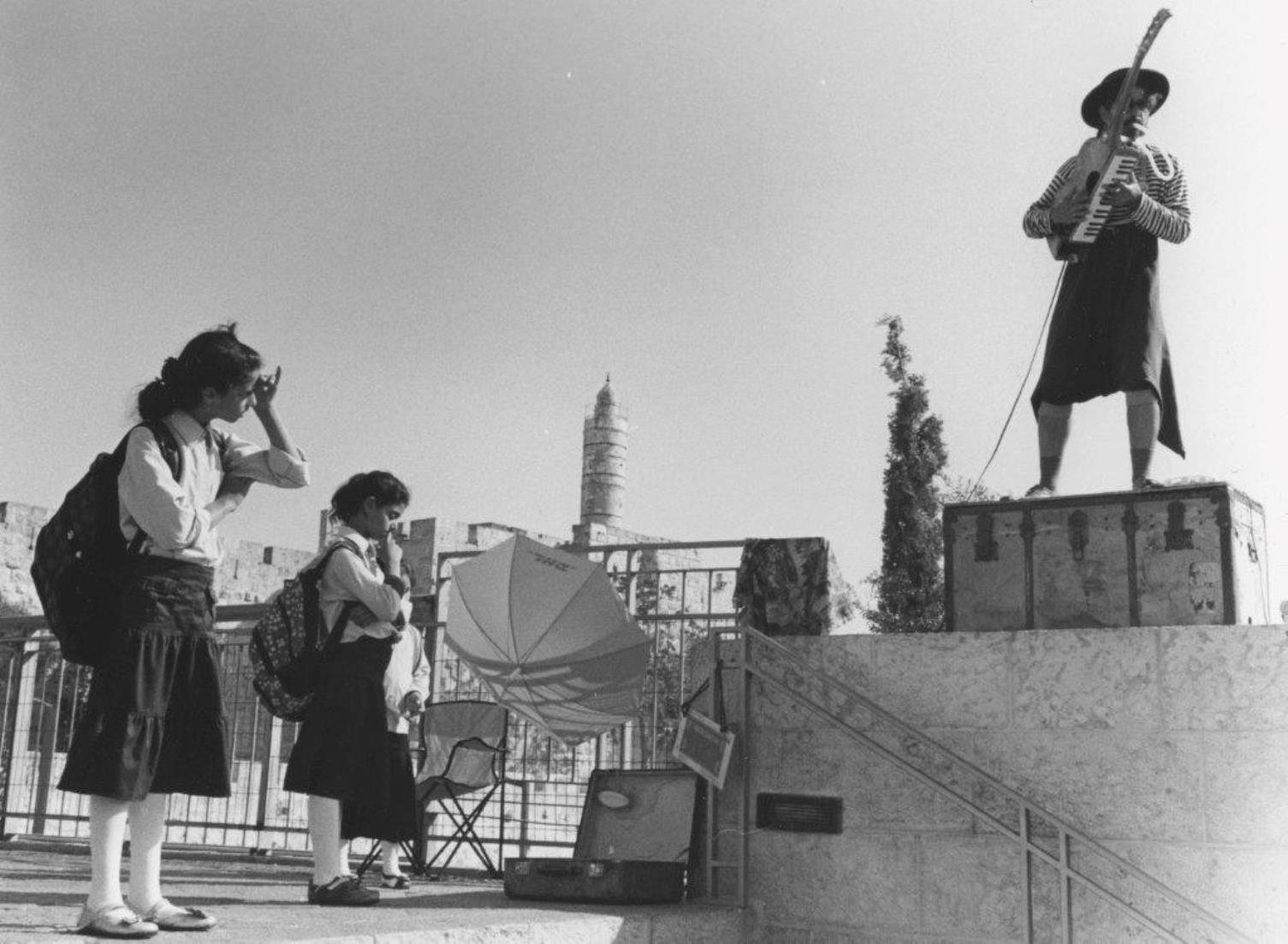 Guitar Player near the Old City. Photo by Paul Margolis