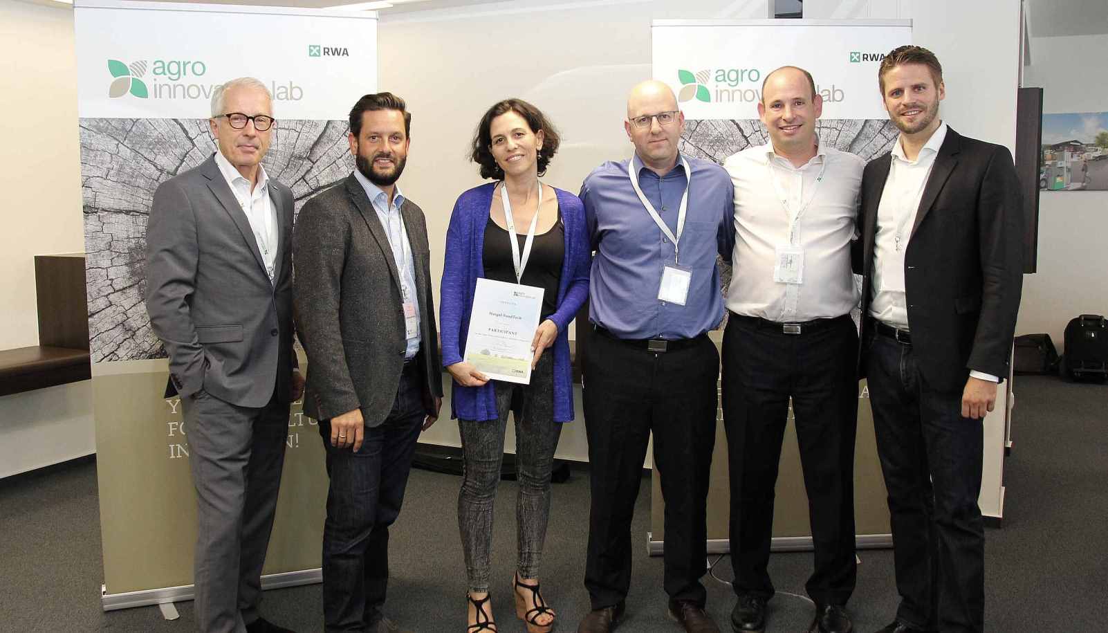From right, Agro Innovation Lab CEO Reinhard Bauer, Hargol FoodTech CEO Dror Tamir and COO Ben Friedman standing with RWA managers after winning the award. Photo: courtesy