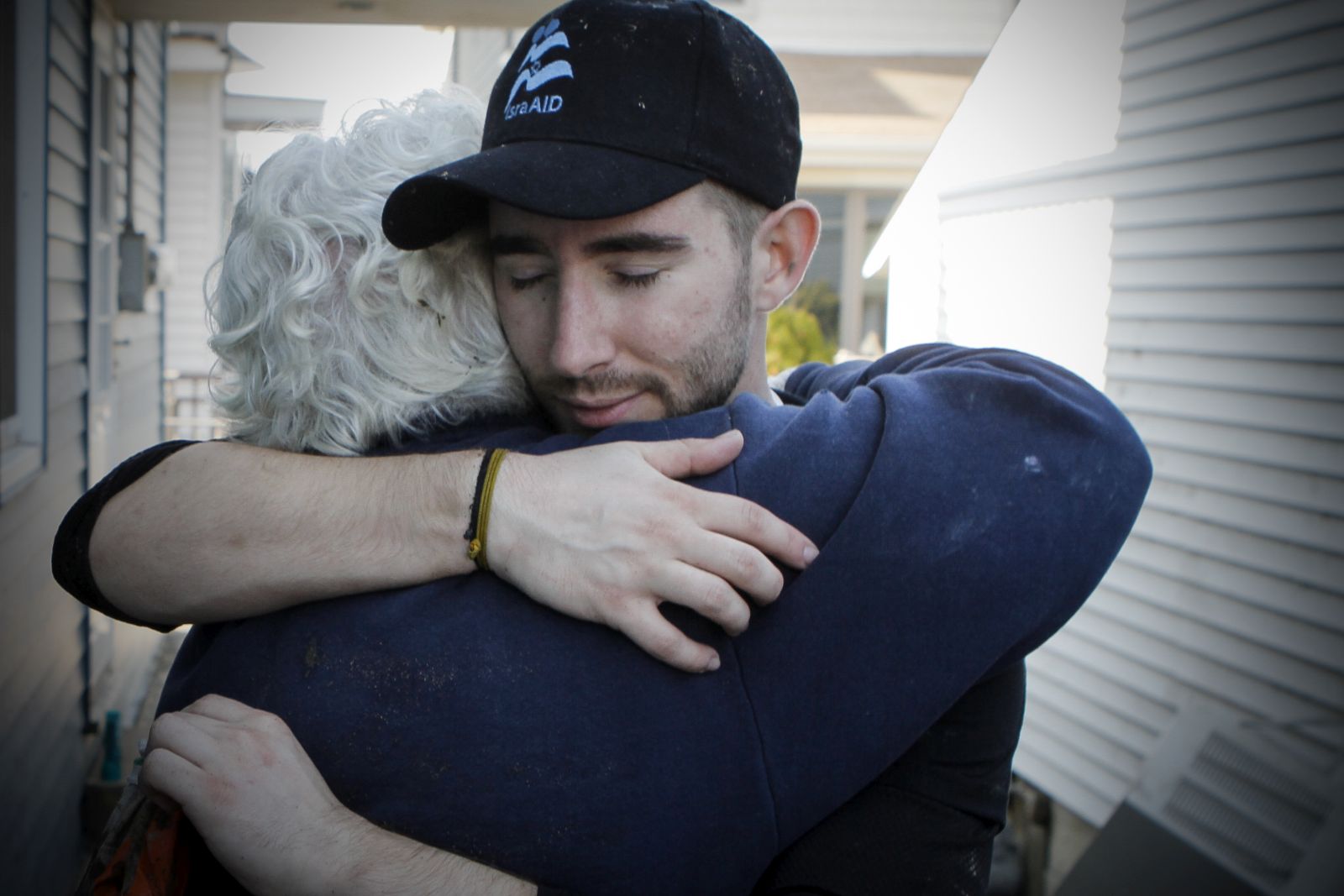 A member of IsraAid offers a supportive hug to a victim of Hurricane Sandy. Photo by Mickey Noam-Alon, IsraAid